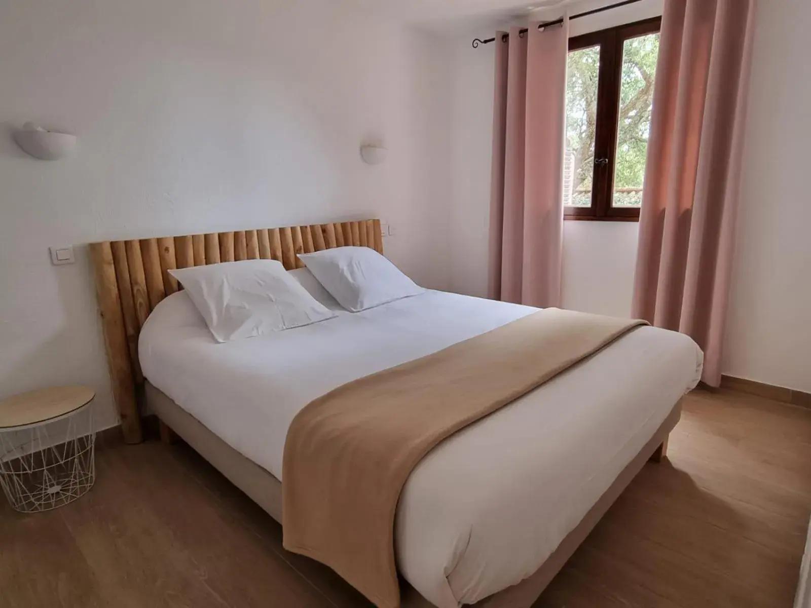 Bed in Bungalows Du Maquis